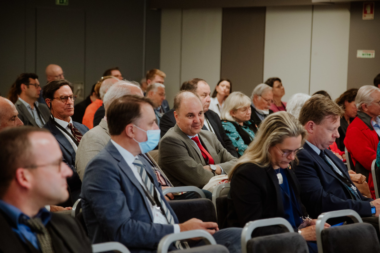 photo of conference delegates listening to presentation